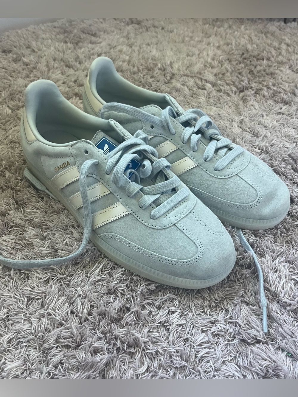 Light blue adidas sambas like-new